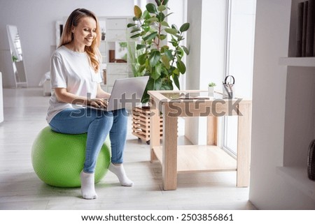 Similar – Image, Stock Photo Sportive woman sitting on sandy beach in asana