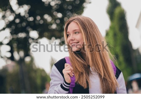 Similar – Image, Stock Photo teenager in uniform wonders about the sharpness of the sickle she is holding in her hand … and at the same time is a little worried she might hurt herself