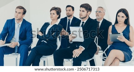 Similar – Image, Stock Photo Businesswoman making notes during workday at home