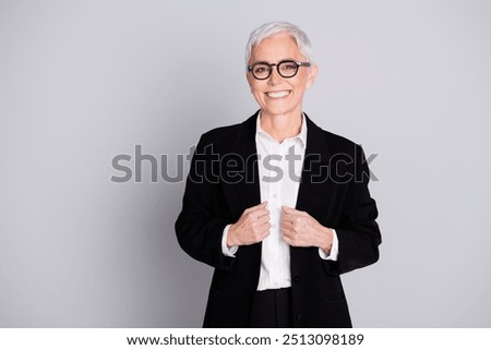 Similar – Image, Stock Photo Gray-haired lady wearing black hat