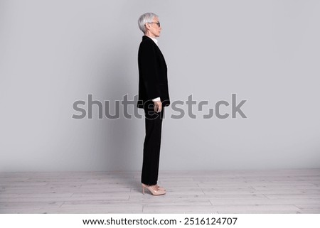 Similar – Image, Stock Photo Gray-haired lady wearing black hat