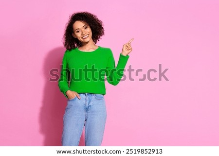 Similar – Image, Stock Photo Young woman wearing green oversize sweater enjoying a windy day in a colorful city