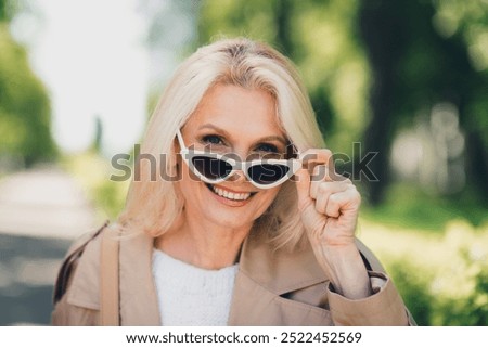 Image, Stock Photo Dreamy female resting on inflatable mattress