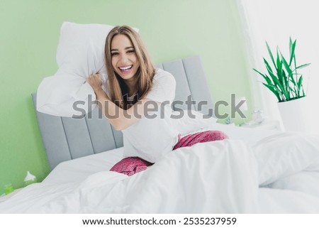 Similar – Image, Stock Photo Pillow fight girl dressed