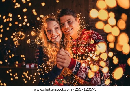 Similar – Image, Stock Photo Young couple enjoying Christmas Lights