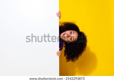 Image, Stock Photo Stylish black lady hiding behind curtain at home