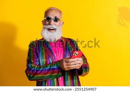 Similar – Image, Stock Photo Smiling eccentric man browsing on smartphone