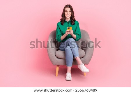 Image, Stock Photo Positive young lady sitting on bicycle on city street in sunlight