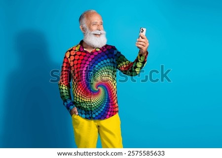 Similar – Image, Stock Photo Smiling eccentric man browsing on smartphone