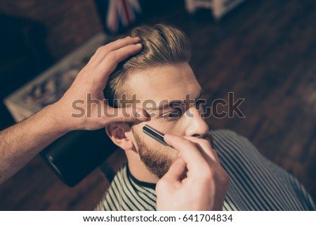 Similar – Image, Stock Photo Crop barber doing haircut for man