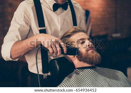 Similar – Image, Stock Photo Crop barber doing haircut for man