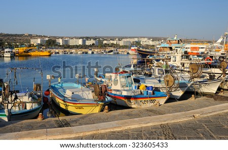 Ayia Napa, Cyprus - September 3, 2015: Boats and yachts at anchor in bay fishing in the city of Ayia Napa