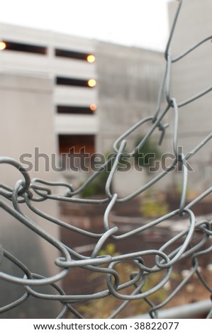 Building Foundation through chain link fence in downtown Boise, Idaho
