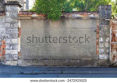 Similar – Foto Bild alte steinige Mauer mit Flechten