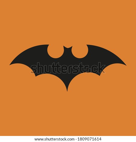 batman logo on orange background
