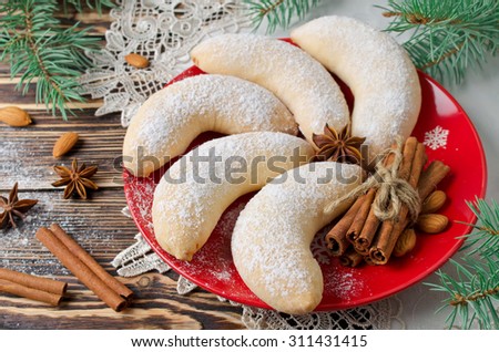 Christmas sugar cookies Crescent sprinkled with powdered sugar. Selective focus