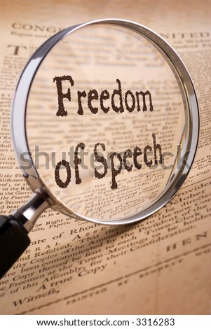 Bill of Rights with Freedom of Speech in magnifying glass
