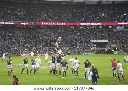 TWICKENHAM LONDON - NOVEMBER 23: South African Player Jumps for Ball at England vs South Africa, England playing in white lose 16-15, at QBE Rugby Match on November 23, 2012 in Twickenham, England