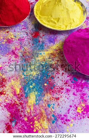 Containers of powder paint during Holi festival