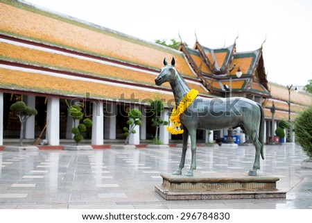 Horse sculpture at Wat Suthat Thepwararam ,  royal temple of first grade, one of ten such temples in Bangkok,Thailand
