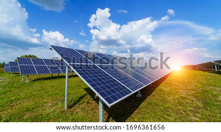 Solar panels on the sky background. Solar power plant. Blue solar panels. Alternative source of electricity. Solar farm. Stock fotó © 