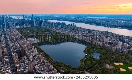 Similar – Image, Stock Photo Aerial perspective at a single tree and a crossing little river in a winter snowy top view.