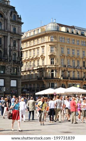 VIENNA, AUSTRIA - JULY 10, 2011: Crowds of tourists visiting the historical center of Vienna, Austria