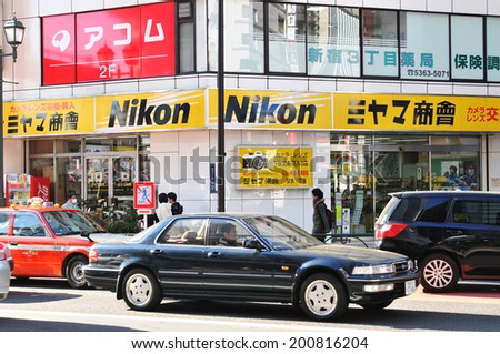 TOKYO, JAPAN - DECEMBER 28, 2011: Nikon camera store in Shinjuku, major commercial and administrative district in Tokyo