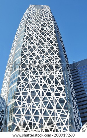 TOKYO, JAPAN - DECEMBER 28, 2011: Modern architecture of the Mode Gakuen Cocoon Tower, a 204-metre 50-story educational facility located in the Nishi-Shinjuku district in Shinjuku, Tokyo, Japan.