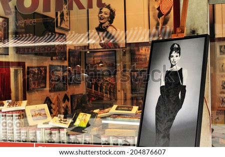 VENICE, ITALY - MAY 6, 2012: Celebrities pictures for sale in vintage print shop in Rialto, major touristic and commercial area in Venice