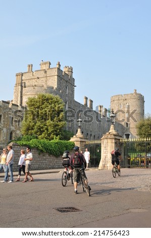 WINDSOR, UK - APRIL 24, 2011: People enjoy their time outdoors at the Windsor Castle