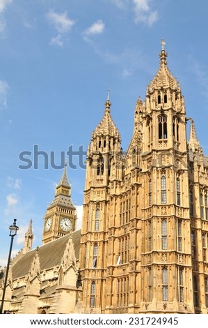Architectural detail of the British Parliament building against blue sky