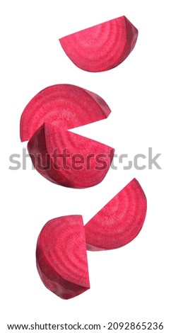 pieces of beetroot flying in the air, isolated on a white Stock fotó © 