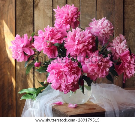 Still life with a bouquet of peonies