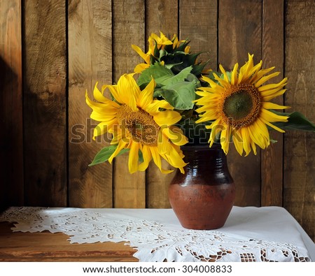 Still life with a bouquet of sunflowers. Sunflowers.