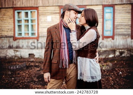 Lovely couple in stylish brown clothes