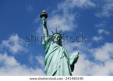 The Statue of Liberty in the Clouds - Liberty Island, New York, New York City, United States