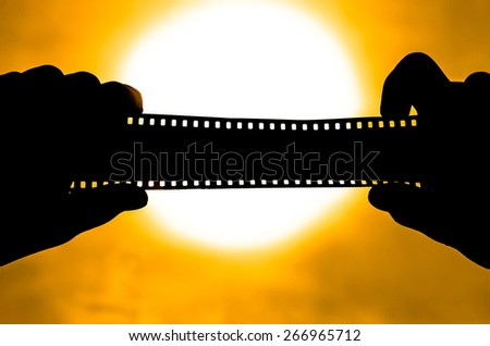 film in the sun in the hands of