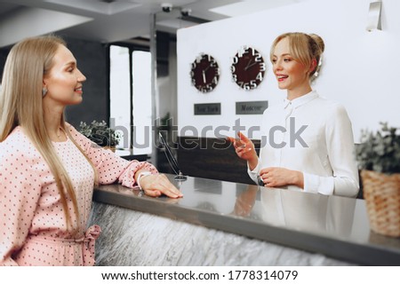 Similar – Image, Stock Photo blonde woman in front of a brick wall II