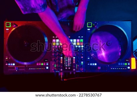 Similar – Image, Stock Photo DJ mixing music during party in club