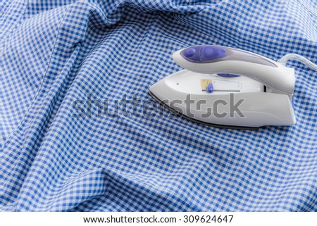 Ironing clothes, laundry housework