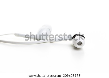 White earphones on white background