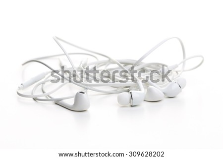 White earphones on white background