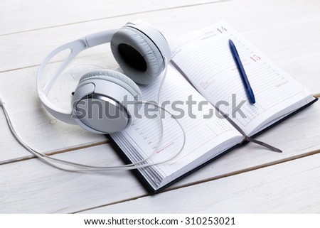 Working place, white headphones