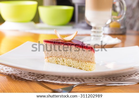 Slice of souffle cake with jam topping