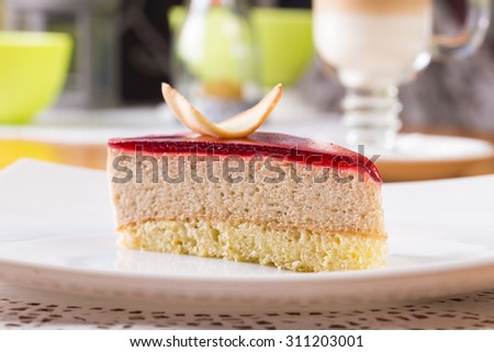 Slice of souffle cake with jam topping
