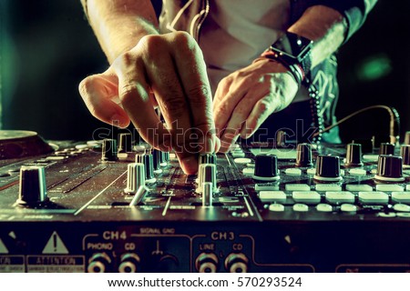 DJ playing music at mixer closeup Сток-фото © 