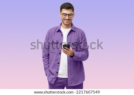 Similar – Image, Stock Photo Trendy man using smartphone in city