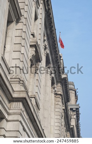 a landmarks of shanghai china with a china flag