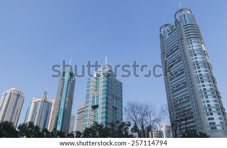 SHANGHAI-FEB. 9, 2015: Buildings at Lujiazui, a national-level development zone designated by government. In 2005, State Council reaffirmed positioning of Lujiazui area as finance and trade zone.